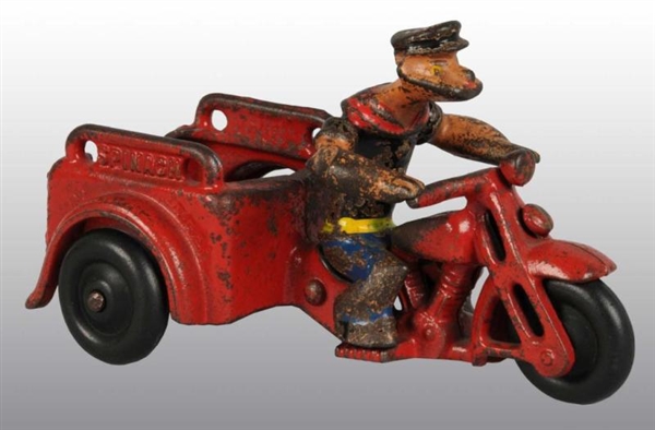 CAST IRON HUBLEY SPINACH CYCLE TOY.               