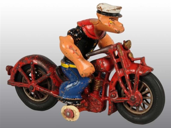 CAST IRON POPEYE MOTORCYCLE TOY.                  