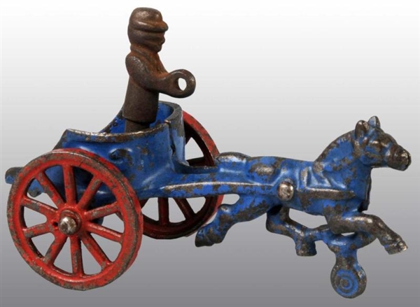 CAST IRON HORSE-DRAWN CHARIOT TOY WITH FIGURE.    