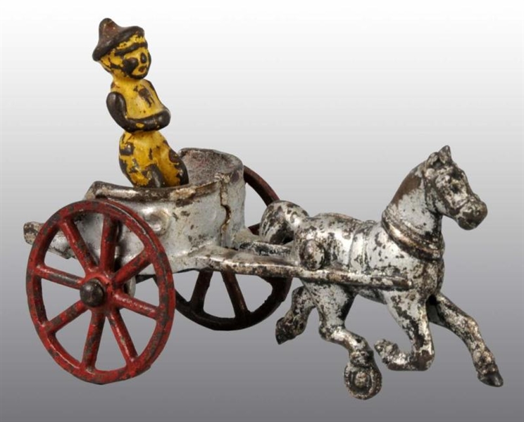 CAST IRON HORSE-DRAWN CHARIOT WITH CLOWN.         
