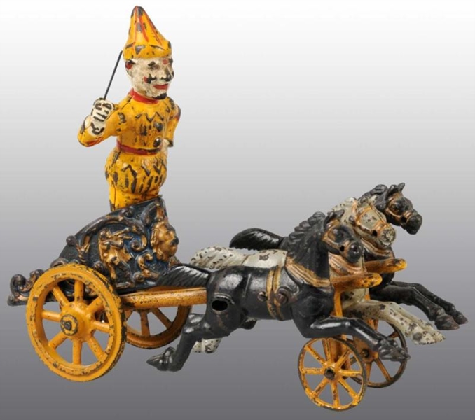 CAST IRON HUBLEY CLOWN CHARIOT TOY.               