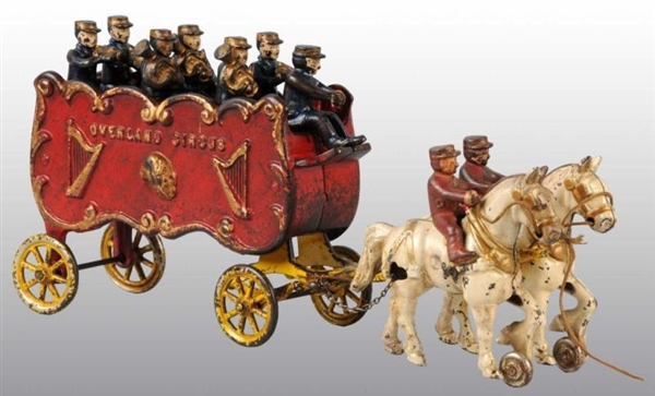 CAST IRON 2-HORSE OVERLAND CIRCUS BAND WAGON TOY. 