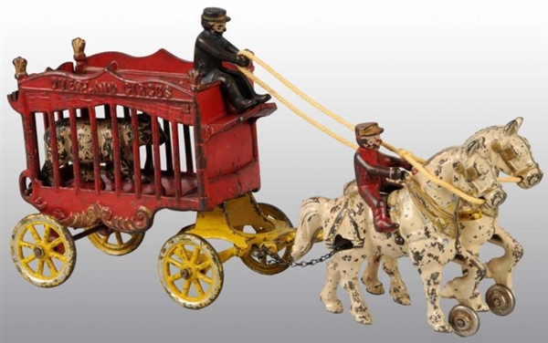 CAST IRON 2-HORSE OVERLAND CIRCUS CAGE WAGON TOY. 
