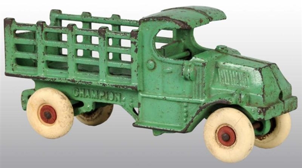 CAST IRON CHAMPION STAKE TRUCK TOY.               