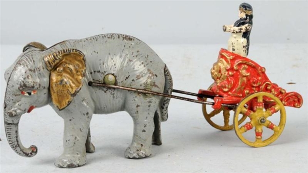 CAST IRON HUBLEY ELEPHANT CHARIOT BANK TOY.       