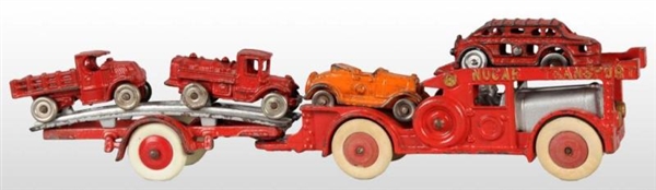 CAST IRON HUBLEY NEW CAR CARRIER TOY.             