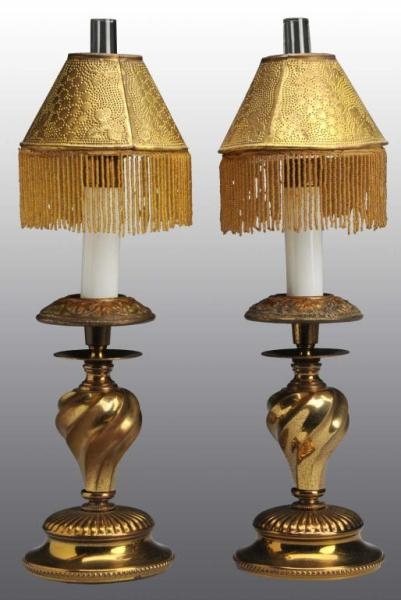 PAIR OF BRASS CANDLE LAMPS.                       