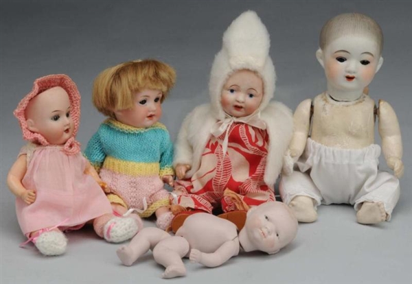 LOT OF 5: BISQUE DOLLS.                           