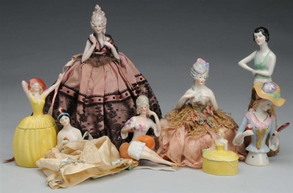 LOT OF 8: CHINA HALF DOLLS AND DRESSER BOXES.     