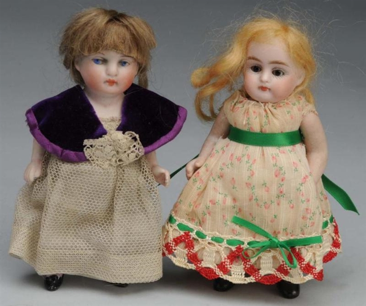 LOT OF 2: ALL-BISQUE DOLLS.                       