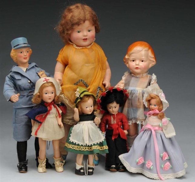 LOT OF 7: COMPOSITION DOLLS.                      