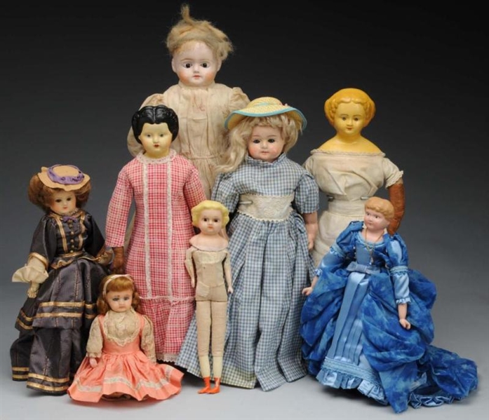 LOT OF 8: PAPIER-MACHÉ AND WAX DOLLS.             