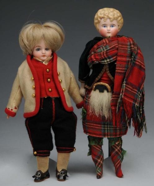 LOT OF 2: BISQUE SHOULDER HEAD DOLLS.             