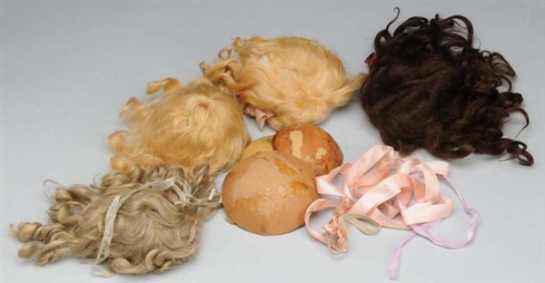 LOT OF 4: MOHAIR WIGS.                            