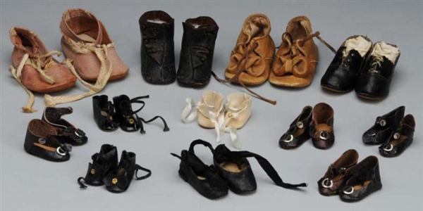 LOT OF 9: PAIRS OF ANTIQUE DOLL SHOES.            