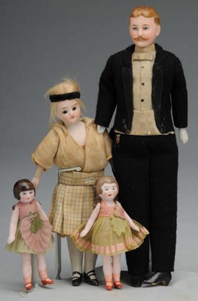 LOT OF 4: DOLL HOUSE DOLLS.                       