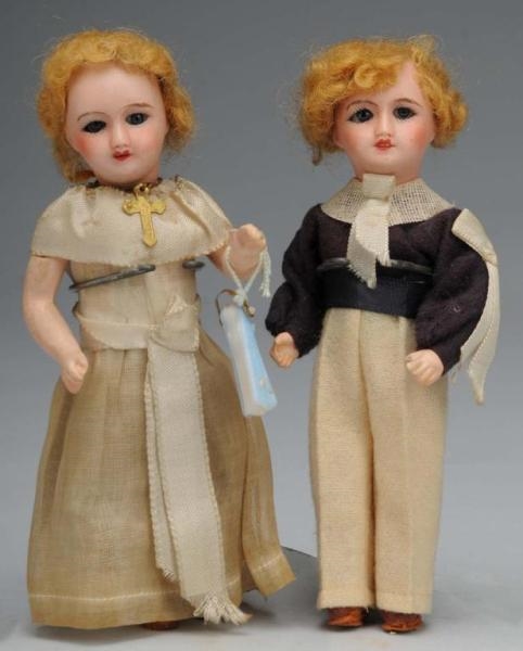 LOT OF 2: BISQUE DOLLS.                           