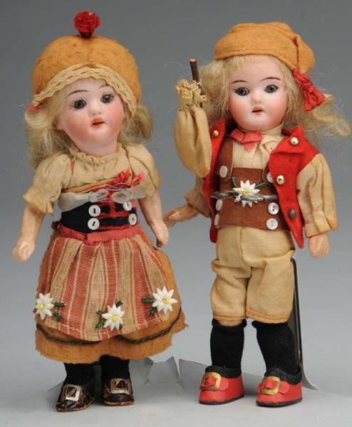 LOT OF 2: GERMAN BISQUE HEAD DOLLS.               