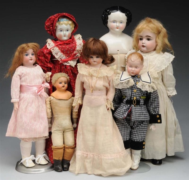 LOT OF 7: ASSORTED DOLLS.                         