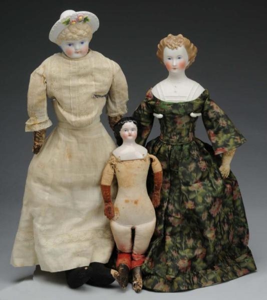 LOT OF 3: ANTIQUE DOLLS.                          