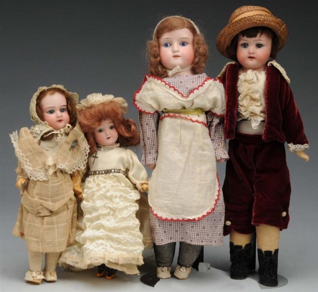 LOT OF 4: GERMAN BISQUE DOLLS.                    