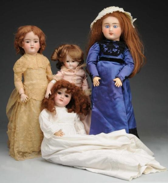 LOT OF 4: GERMAN & FRENCH  BISQUE DOLLS.          