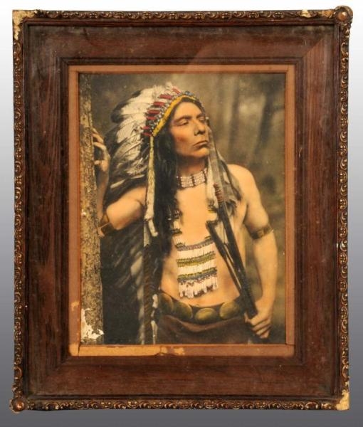 PAINTED PHOTOGRAPH OF NATIVE AMERICAN INDIAN.     