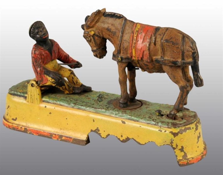CAST IRON ALWAYS DID SPISE A MULE MECHANICAL BANK
