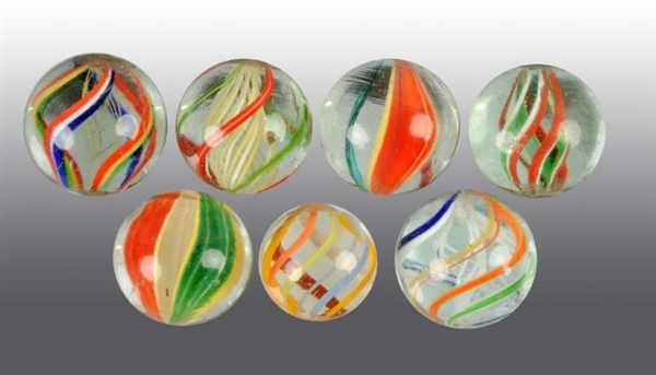 LOT OF 7: HAND-MADE MARBLES.                      