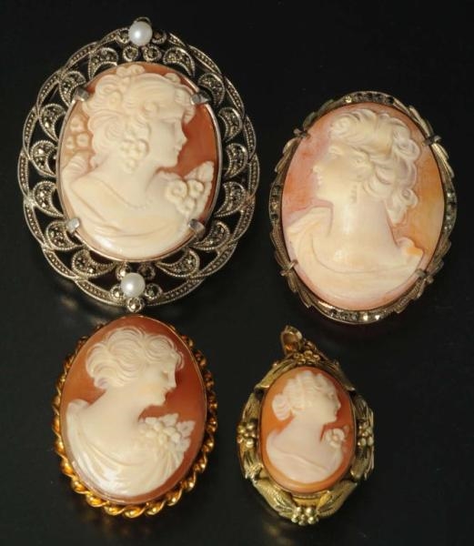 LOT OF 4: ANTIQUE CAMEO PINS.                     