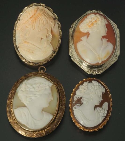 LOT OF 4: ANTIQUE CAMEO PINS.                     