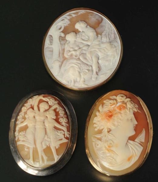 LOT OF 3: ANTIQUE CAMEO PINS.                     
