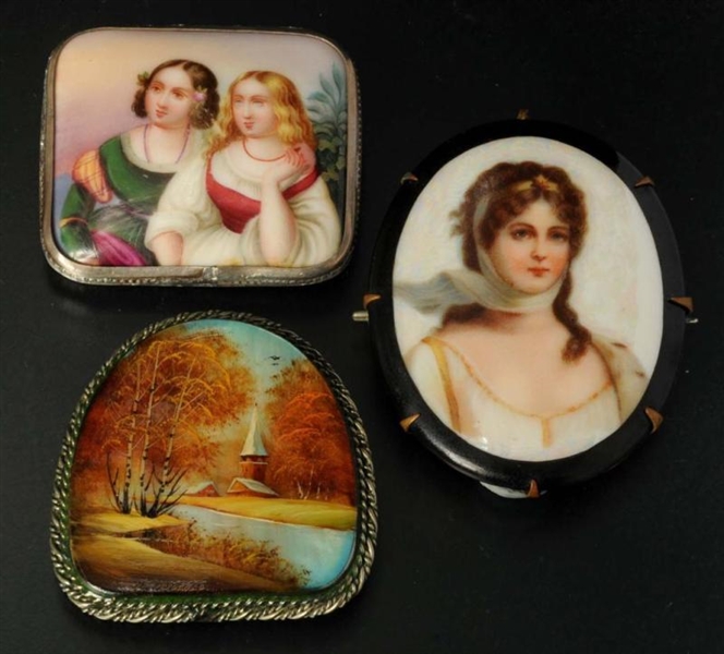 LOT OF 3: HAND-PAINTED PORCELAIN PINS.            