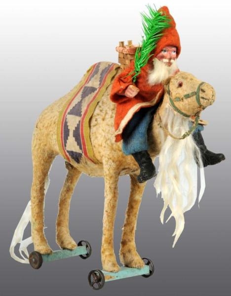SANTA CLAUS ON CAMEL CHRISTMAS PULL TOY.          