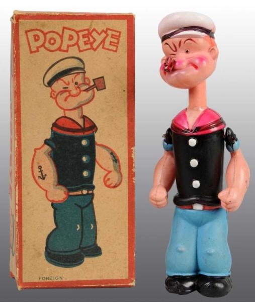CELLULOID POPEYE WIND-UP TOY IN ORIGINAL BOX.     