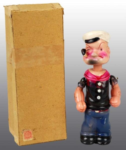 CELLULOID POPEYE WIND-UP TOY IN ORIGINAL BOX.     