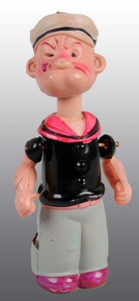 CELLULOID POPEYE WIND-UP TOY.                     