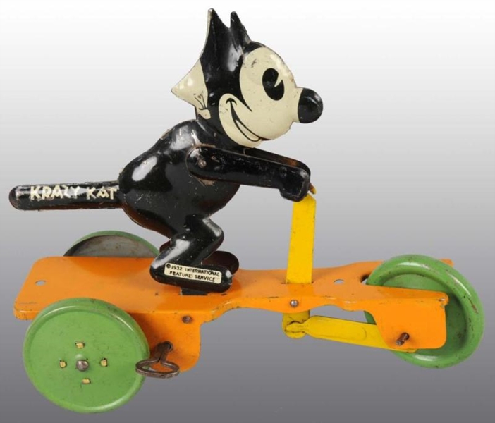 TIN LITHO CHEIN KRAZY KAT SCOOTER WIND-UP TOY.    