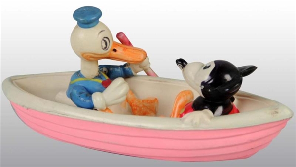 CELLULOID MICKEY MOUSE & DONALD DUCK IN BOAT TOY. 