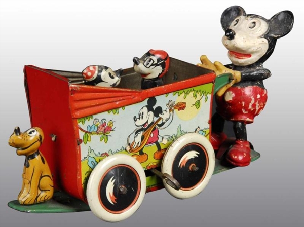 TIN ENGLISH WELLS MICKEY MOUSE TRAM TOY.          