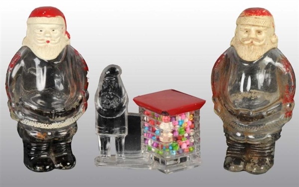 LOT OF 3: GLASS SANTA CANDY CONTAINERS.           