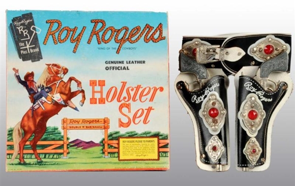 ROY ROGERS TOY DOUBLE HOLSTER SET.                