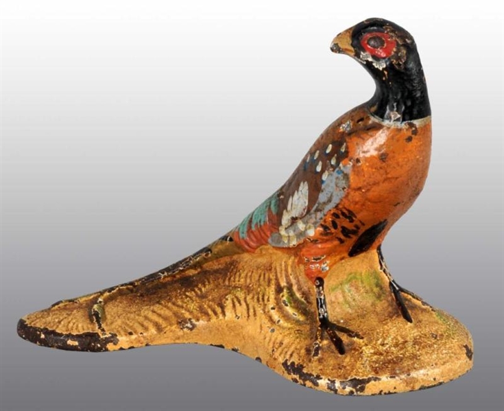 CAST IRON PHEASANT PAPERWEIGHT.                   
