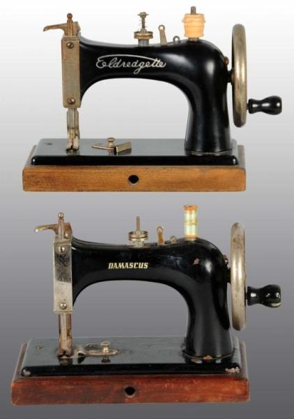 LOT OF 2: CHILDS TOY SEWING MACHINES.            