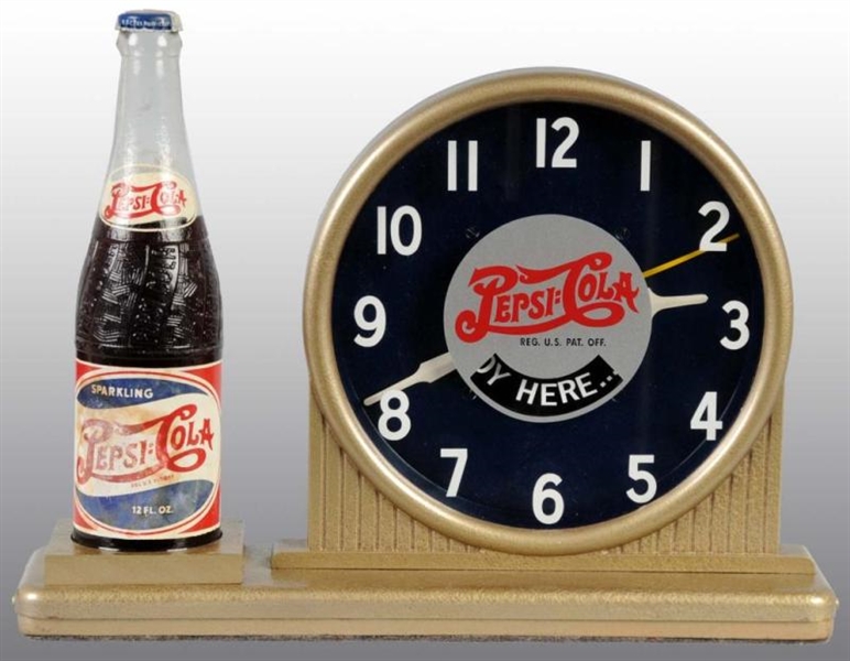 ELECTRIC PEPSI-COLA CLOCK WITH BOTTLE.            