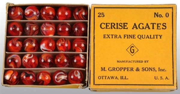 BOX OF M. GROUPER & SONS MARBLES.                 