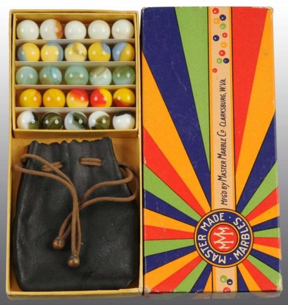 BOX OF MASTER MADE MARBLES.                       