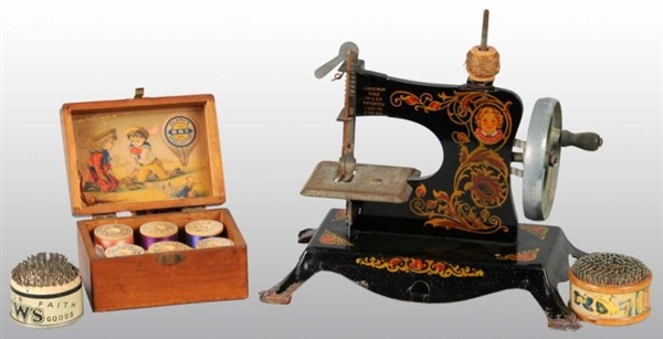 LINDSTROM CHILDS TOY SEWING MACHINE.             