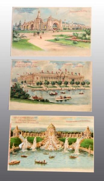 LOT OF 3: WORLDS FAIR HOLD TO LIGHT POSTCARDS.   