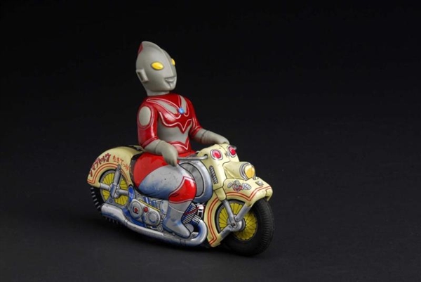 ULTRA MAN ON MOTORCYCLE TOY.                      